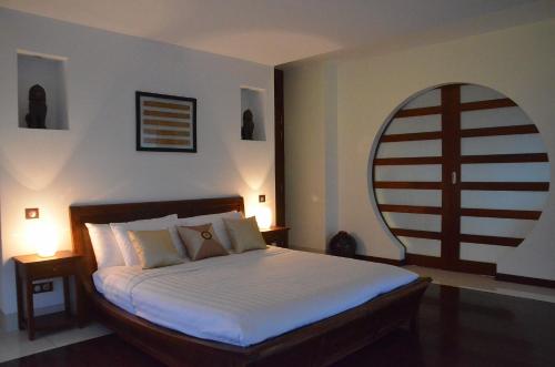 Een bed of bedden in een kamer bij Cominsia Lodge