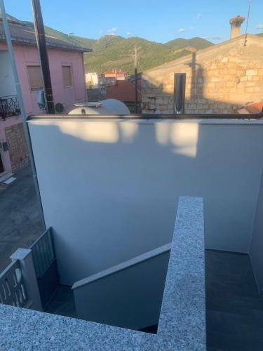a view of a swimming pool in a house at Luciano Home in Gonnesa