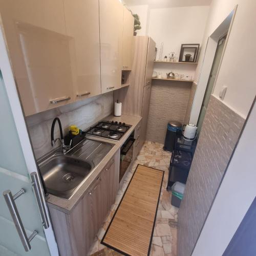 Una cocina o zona de cocina en Appartamento Orchidea