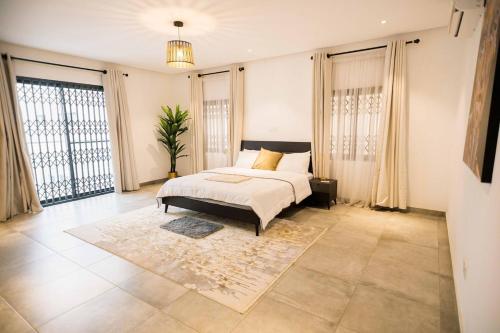 Postel nebo postele na pokoji v ubytování City Link Suites - 3 Bedroom Ideal For Families & Friends