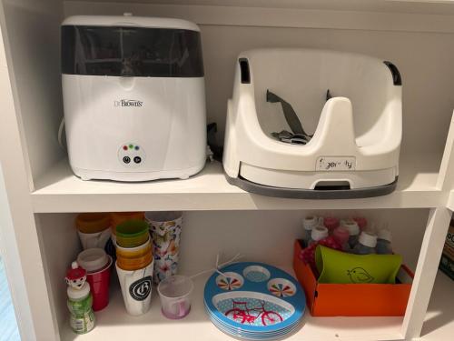a kitchen appliance sitting on top of a shelf at Por Que No Los Dos in Marble Falls
