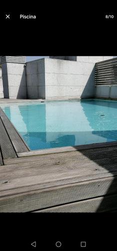 Estudio con piscina comunitaria