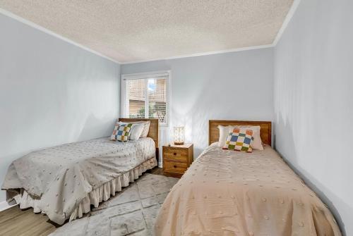 Ένα ή περισσότερα κρεβάτια σε δωμάτιο στο Waipani Resort & Villas 2 Bedroom