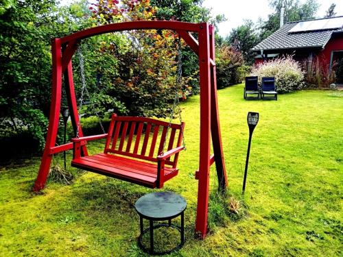Taman di luar PINTO ROSSO Ihr Urlaubsdomizil am Neuringer Moorsee