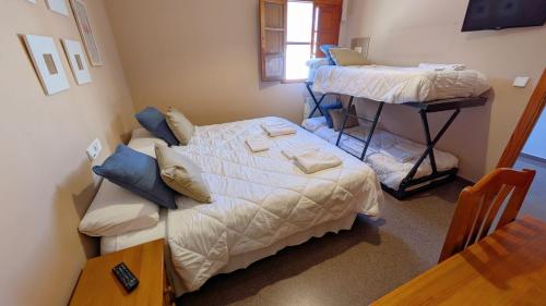 Postel nebo postele na pokoji v ubytování Hostal El Convent de Moncada