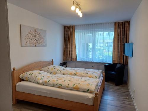 Ένα ή περισσότερα κρεβάτια σε δωμάτιο στο Appartement-Residenz Suite 1