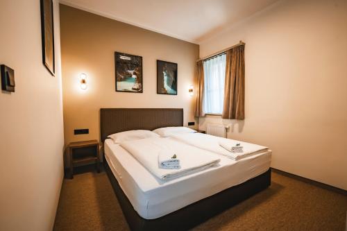 Guest House EJGAにあるベッド