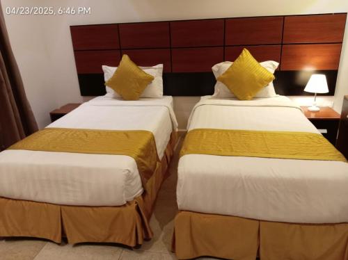 Katil atau katil-katil dalam bilik di فندق لجين الفرسان lojain Alfursan hotel