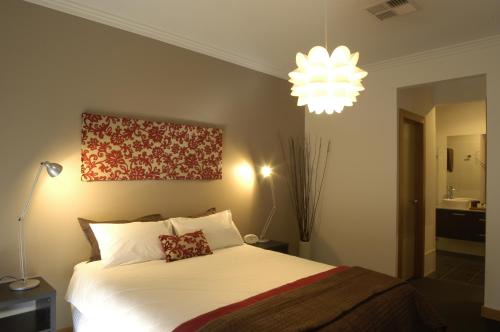 Katil atau katil-katil dalam bilik di Abode Bendigo Apartments