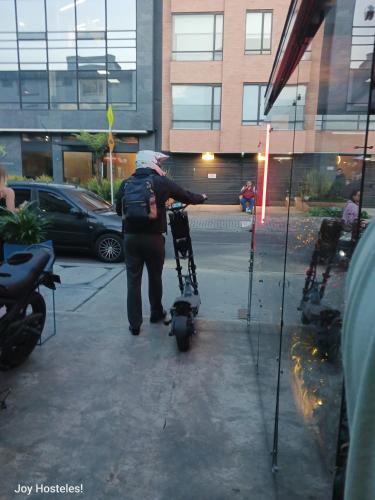 a man standing in front of a set of microphones at Hostel Joy Calle 85 in Bogotá