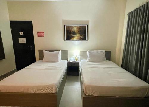 Cama o camas de una habitación en Sakan 275