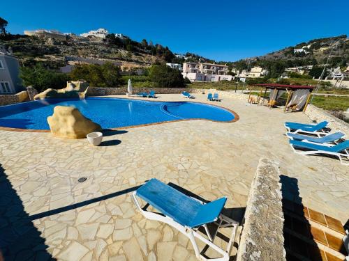 Calpe Casa adosada entorno playa y montaña tranquilidad relax jacuzzi piscina wifi aire jardin barbacoa y parking