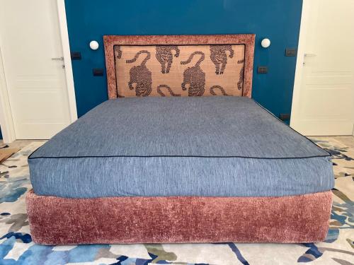 En eller flere senge i et værelse på Glass & Charme - Central Suite