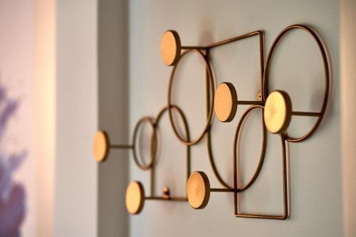 a pair of glasses hanging on a wall at Rooms Indigo Bundek in Zagreb