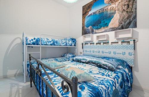 Postel nebo postele na pokoji v ubytování Sea Breeze