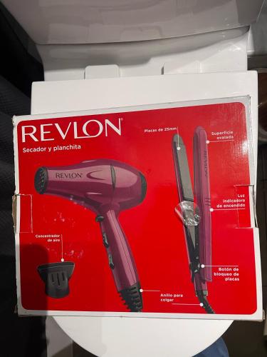 a red box with a revlon iron in it at 17 Apartamento en Santiago en frente a Metro - Estadio - Hipodromo de Chile in Santiago