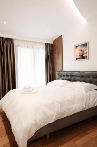 เตียงในห้องที่ Apartment 104