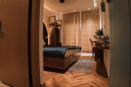 Ein Bett oder Betten in einem Zimmer der Unterkunft Joey's By The Ganges