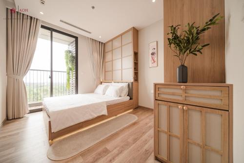 Ένα ή περισσότερα κρεβάτια σε δωμάτιο στο Onsen Ecopark Home
