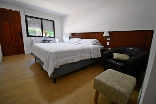 Postel nebo postele na pokoji v ubytování Trinidad Inn Trinidad
