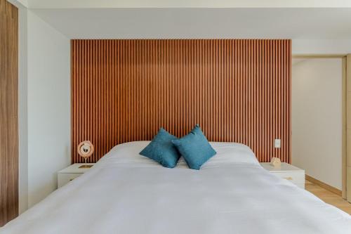 Postel nebo postele na pokoji v ubytování BAYSlDE- Exclusive 2 BDR by Casa Paraiso