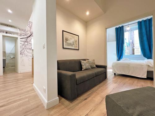 Ένα ή περισσότερα κρεβάτια σε δωμάτιο στο Happy Family Apartments Orefici