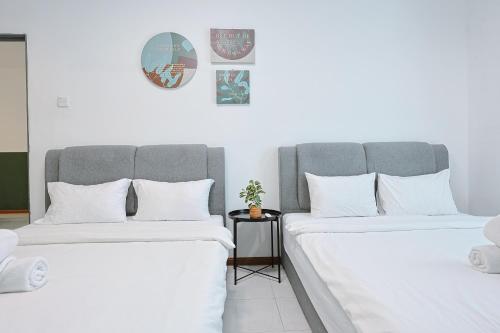 Postel nebo postele na pokoji v ubytování Elegant Studio Escape at Emerald Avenue Cameron Unit 4-03