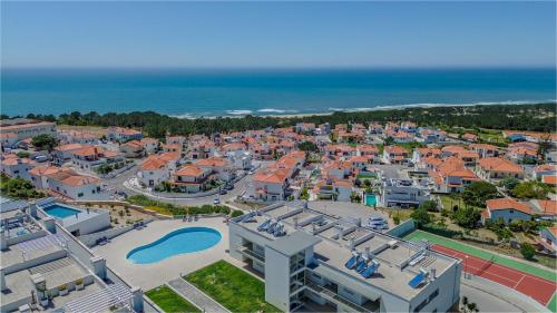 an aerial view of a resort with a swimming pool at Cazenn Nazaré - Apartment Z in Nazaré