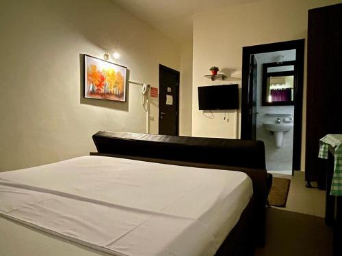 Cama o camas de una habitación en Sakan 275