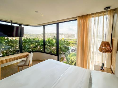 Giường trong phòng chung tại Faranda Collection Cúcuta