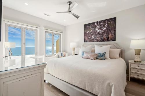 En eller flere senge i et værelse på 5134 Windswept Villa by Akers Ellis Rentals