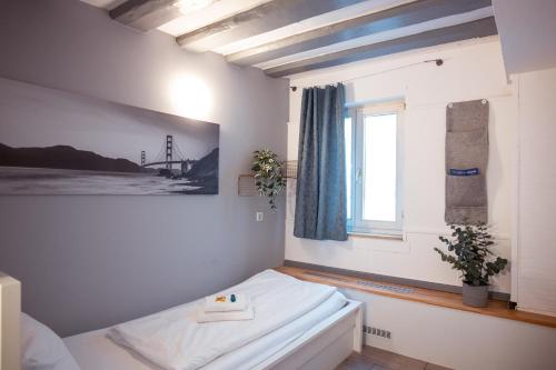 Haus99 Budget Pension & Apartmentsにあるベッド