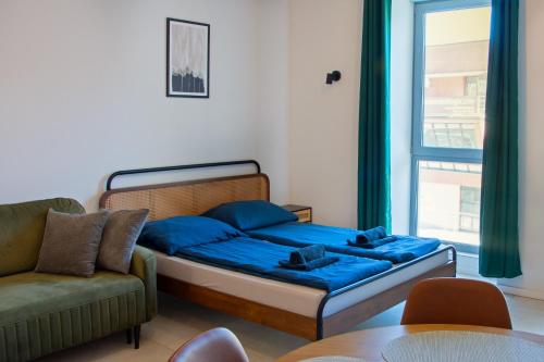 Postel nebo postele na pokoji v ubytování Loft Fabryka Włókna 3c #nestapartamenty