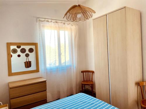 Ένα ή περισσότερα κρεβάτια σε δωμάτιο στο Villa vista mare a Bosa