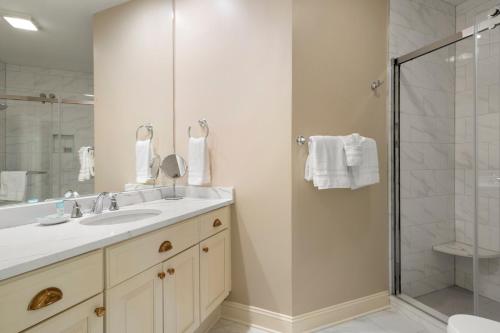 a bathroom with a sink and a shower at 7 Avocet Lane by Akers Ellis Rentals in Kiawah Island