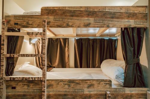 Postel nebo postele na pokoji v ubytování Sea La Vie Inn