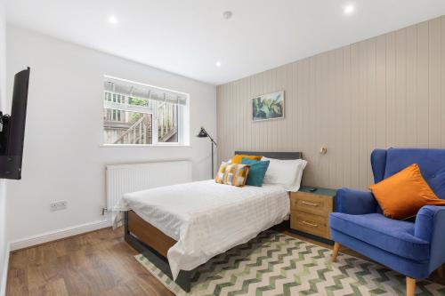 Televiisor ja/või meelelahutuskeskus majutusasutuses Chicstay Suites