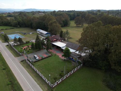 an aerial view of a house with a large yard at Camping Stevin ranc in Bosanska Dubica