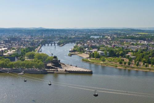 an aerial view of a river with a city at Peak11 Fewo- Panorama View Lahnstein Pool & Sauna in Lahnstein