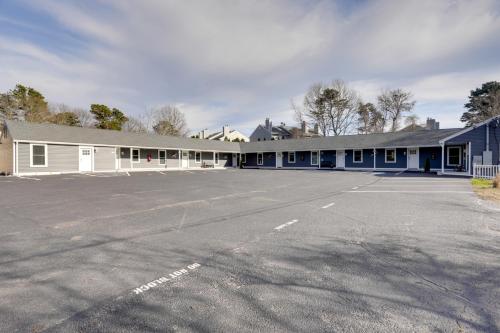 an empty parking lot in front of a building at 3 Mi to Main Street Newly Renovated Wareham Apt! in Wareham