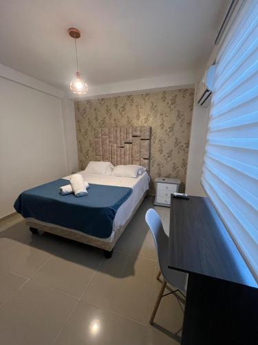Katil atau katil-katil dalam bilik di Apartamento Premium Cali