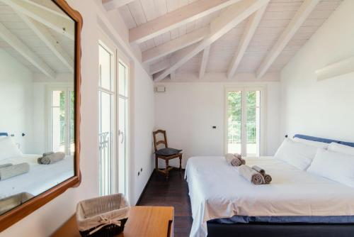 En eller flere senge i et værelse på Como Lake & Mountain