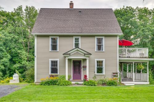 a gray house with a purple door and a yard at Family-Friendly Retreat in Barre 2 Spacious Decks in Barre