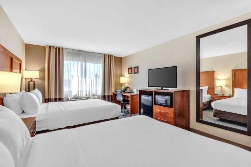 Postel nebo postele na pokoji v ubytování Comfort Inn Denver West Arvada Station