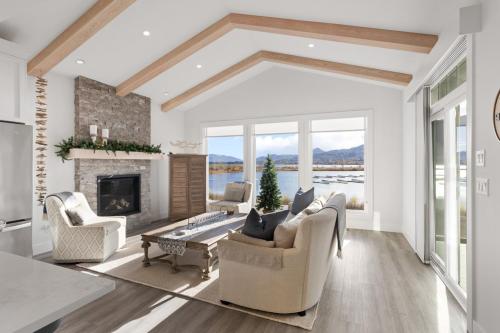 a living room filled with furniture and a fireplace at 165 - 2450 Radio Tower Rd-Jacobson in Osoyoos