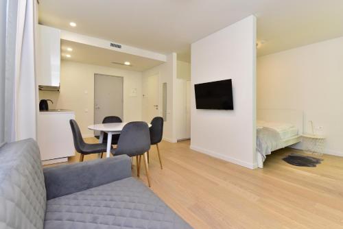 TV o dispositivi per l'intrattenimento presso Apartamentai Eglė, Jūra, Smėlis