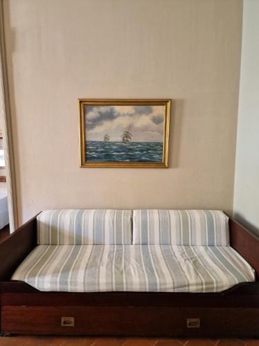 Katil atau katil-katil dalam bilik di Appartamentino con balcone a Porto Ercole