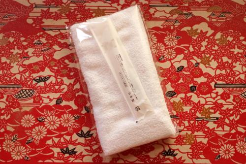 a white towel sitting on top of a table at Sugakuso in Yamanakako