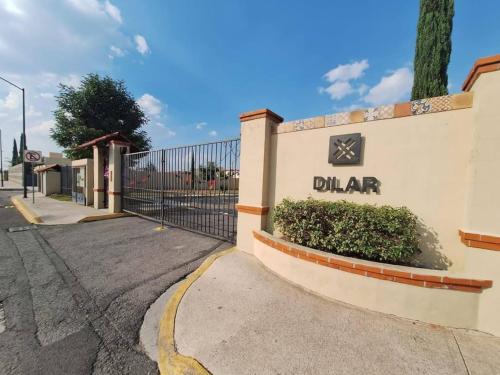 a sign for aldar on the side of a building at Departamento completo en Real Granada in Santa Cruz Tecamac