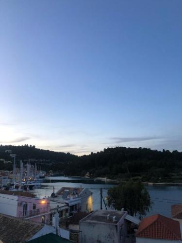 a view of a marina at dusk at Anatoli House Il in Gaios
